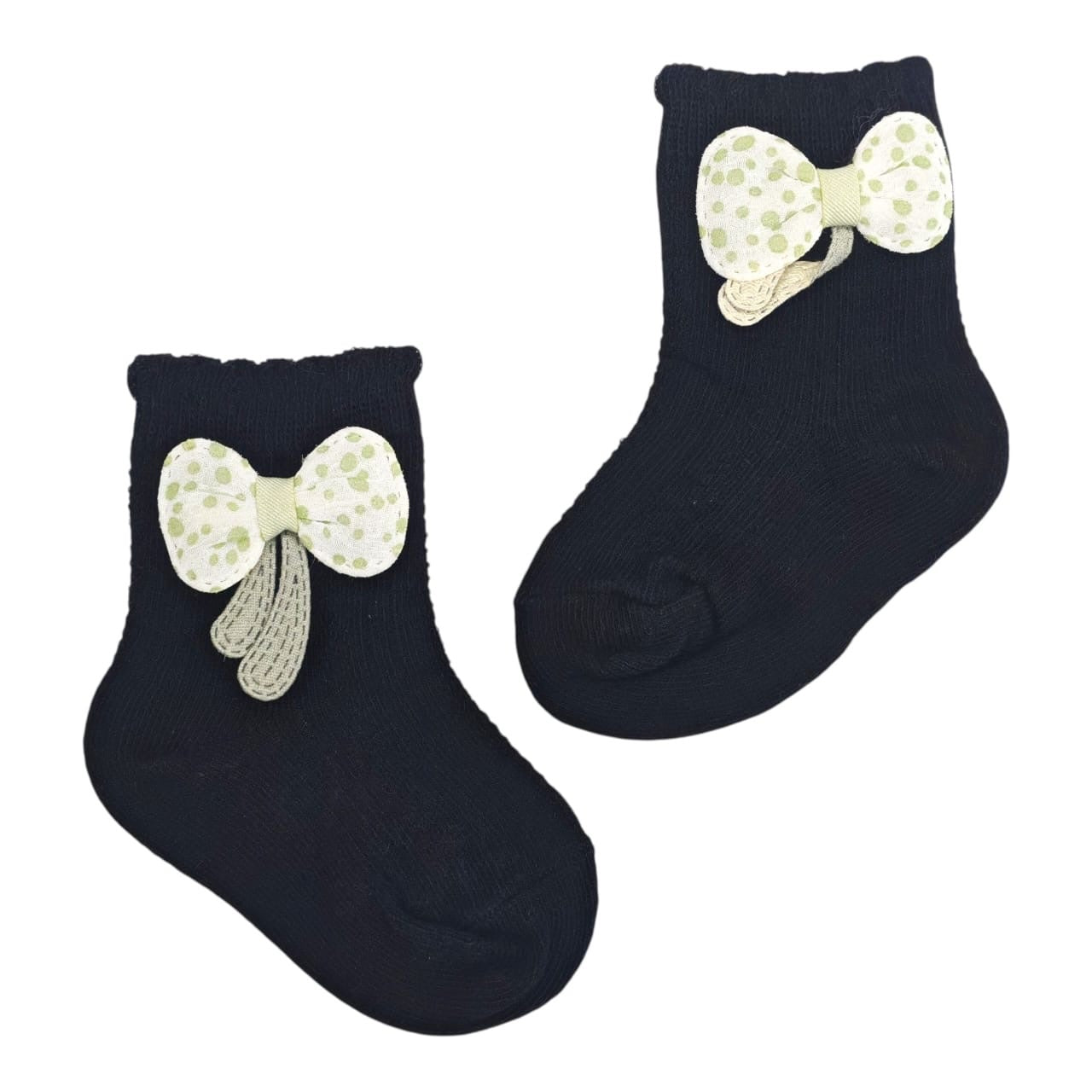 Calcetines Acüchichi para bebé en color negro con lazo decorativo de puntos, tejido suave y elástico.