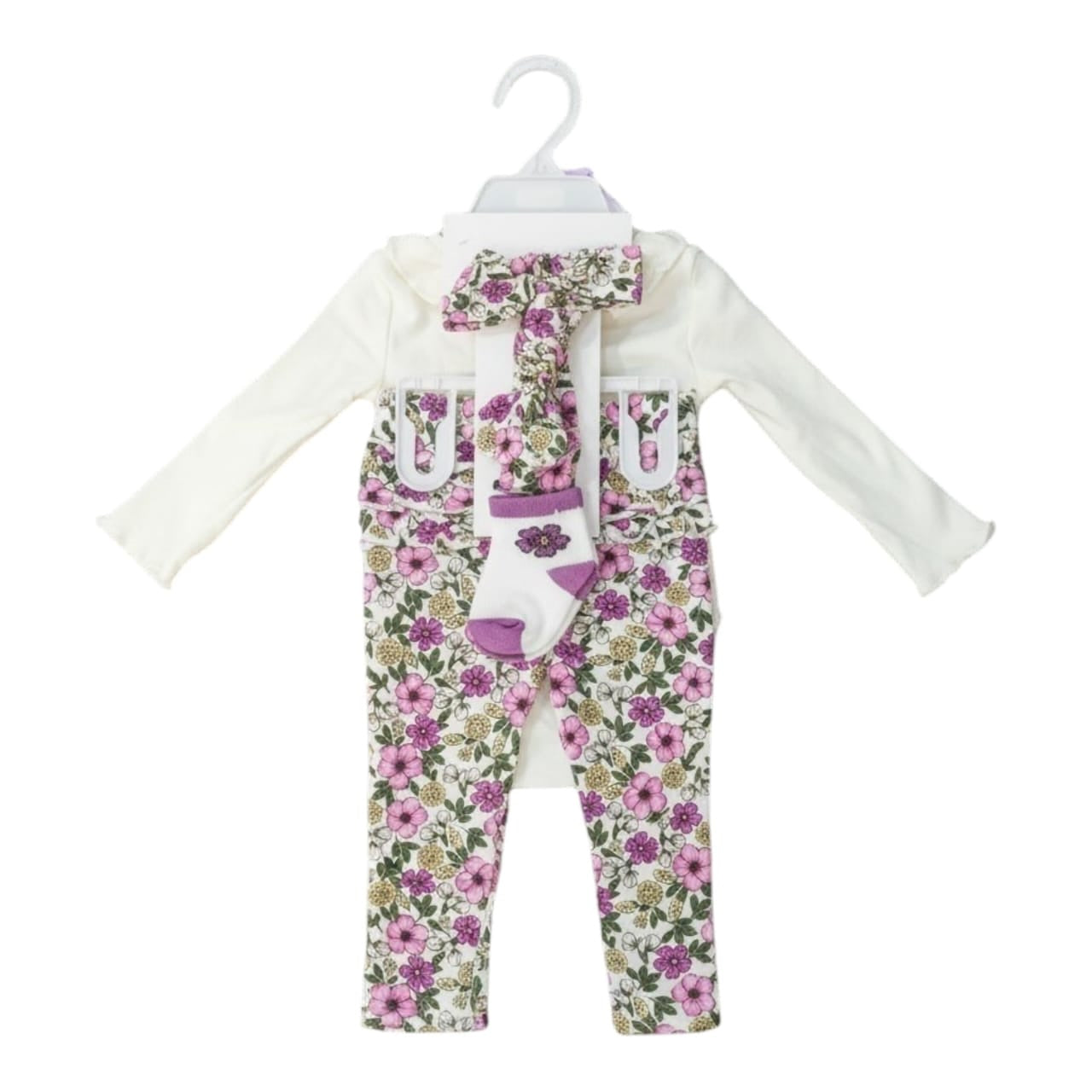 Conjunto Acüchichi de tres piezas para bebé niña con body blanco, legging de estampado floral y calcetines a juego.