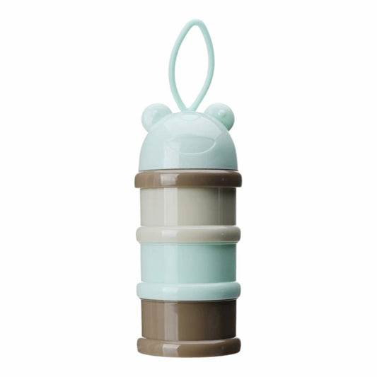 Contenedor apilable Acüchichi de tres niveles en tonos verde menta y marrón con diseño de orejitas para snacks de bebé.