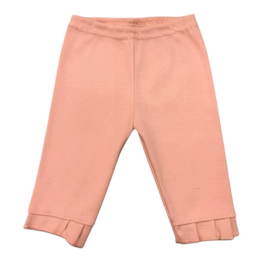Leggings de algodón para bebé Acüchichi en color rosa suave con cintura elástica y detalle de volantes en tobillos