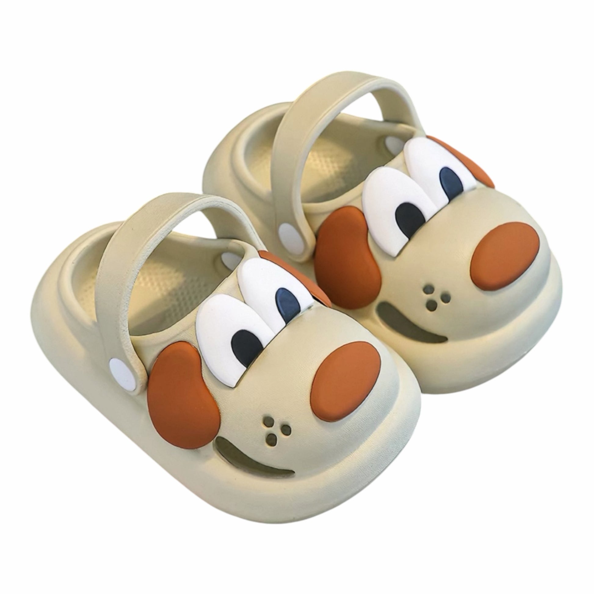 Sandalias tipo zueco Acüchichi para niños en color beige con diseño divertido de perrito y correa trasera ajustable.