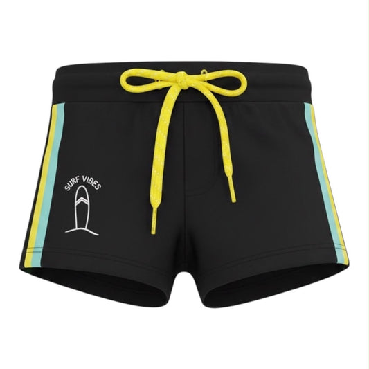 Short de baño Acüchichi negro para niños con franjas laterales turquesa, amarillo y cordón neón con estampado Surf Vibes