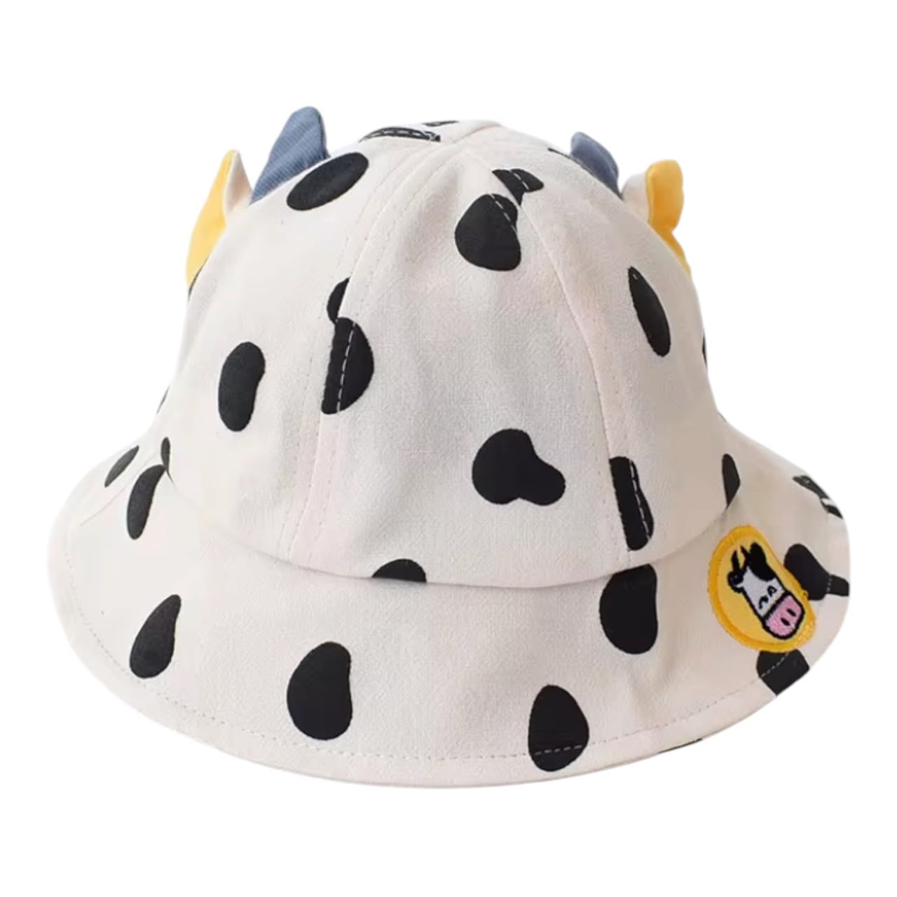 Sombrero tipo pescador Acüchichi para niños con estampado de manchas de vaca, cuernos decorativos y parche bordado.
