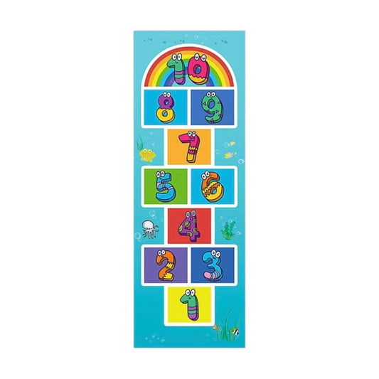Tapete de juego Acüchichi para saltar la rayuela con números coloridos, diseño de arcoíris y motivos marinos infantiles.