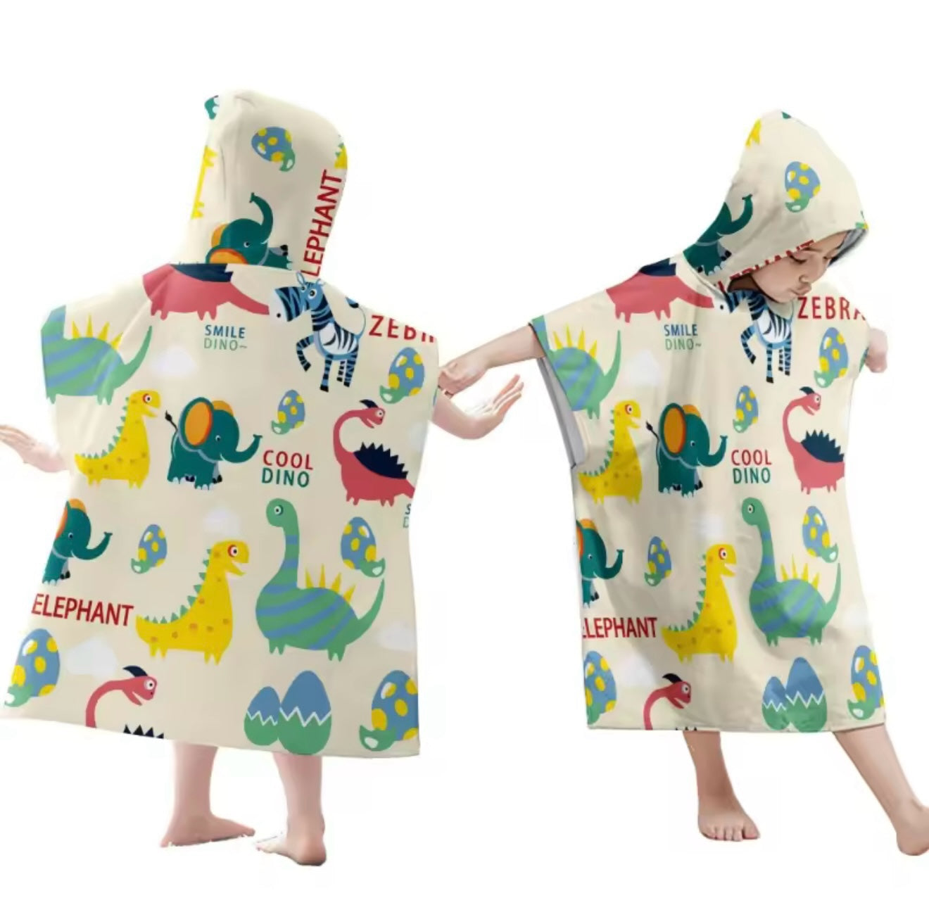 Toalla poncho con capucha Acüchichi para niños con estampado colorido de dinosaurios, elefantes y cebras sobre fondo crema