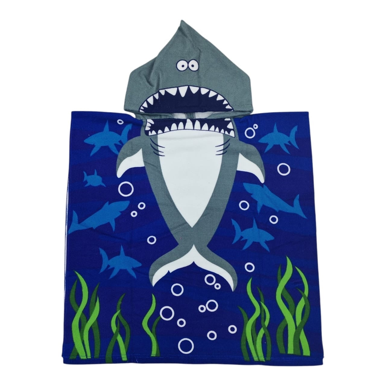 Toalla poncho infantil Acüchichi con capucha de tiburón, diseño azul con estampado submarino, suave y absorbente.